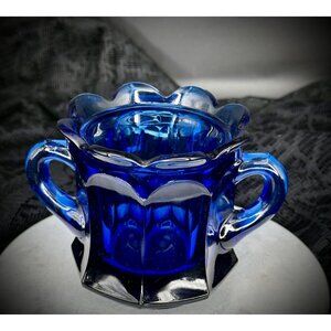 Vintage open sugar bowl made of cobalt blue pressed glass